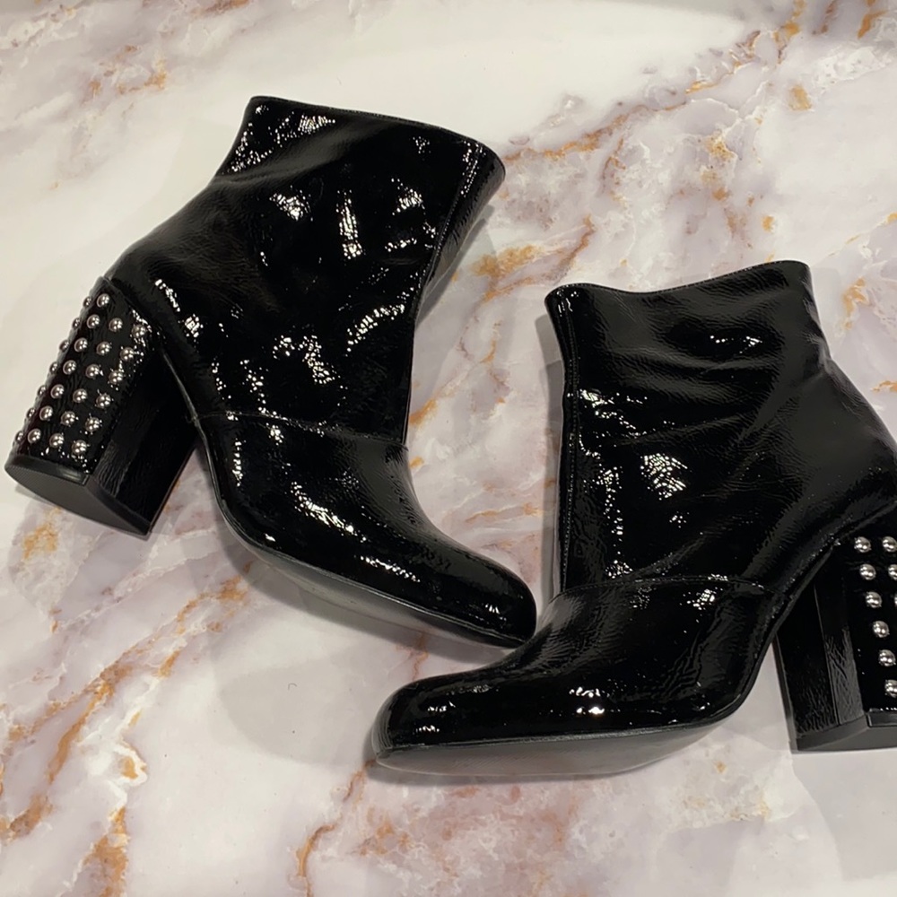 Steve Madden patent leather ankle boot with studded heel .SZ 9